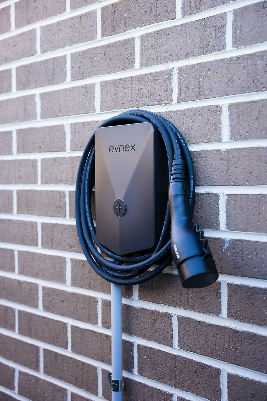 EV charger with its cable coiled